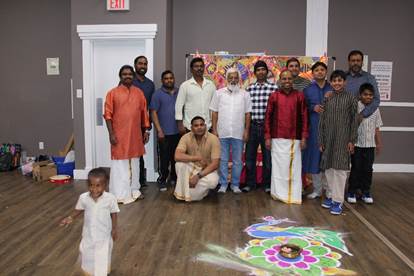 A group of men and a child posing for a photo
AI-generated content may be incorrect.