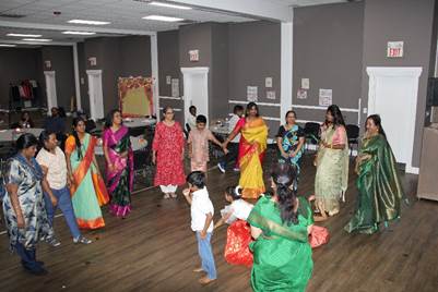 A group of people in colorful dresses
AI-generated content may be incorrect.